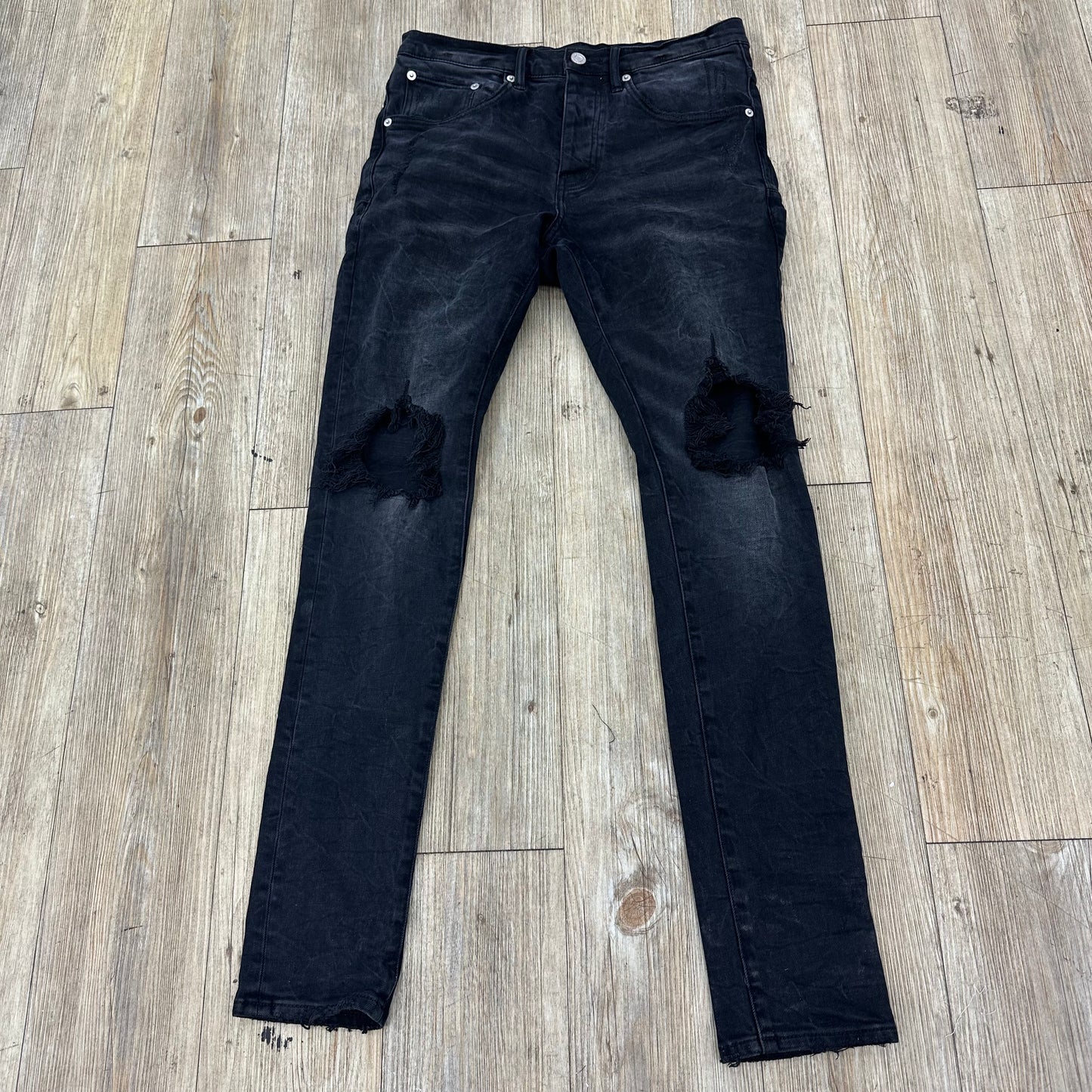 Purple Jean black ripped knee cap w back tag
