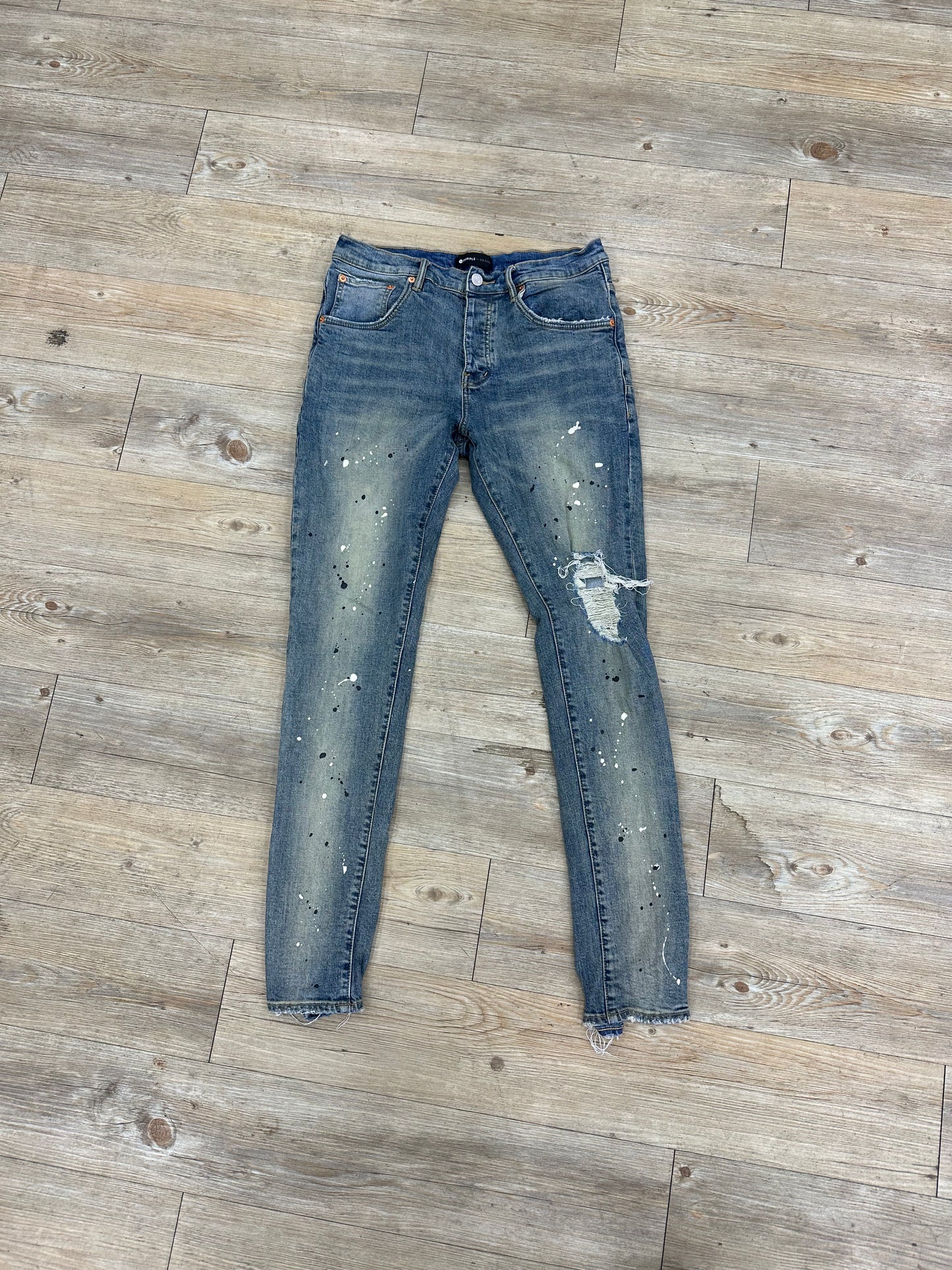 Purple jeans paint splatter used with no back or front tag