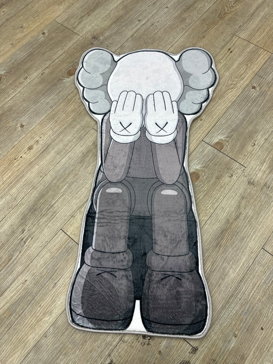 Kaws statue rug