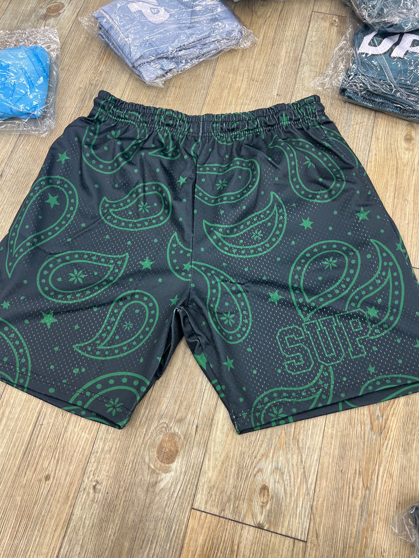 Sup black and dark green shorts